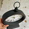 Reloj De Pila Ovalado Con Caja De Madera